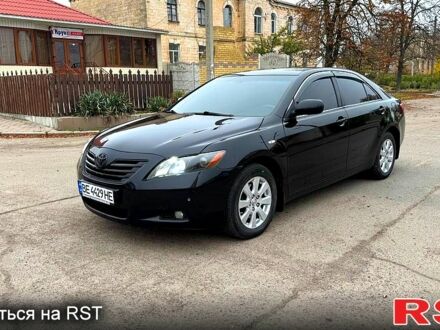 Черный Тойота Камри, объемом двигателя 3.5 л и пробегом 300 тыс. км за 6750 $, фото 1 на Automoto.ua