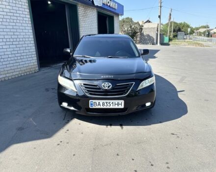Черный Тойота Камри, объемом двигателя 2.4 л и пробегом 275 тыс. км за 7500 $, фото 1 на Automoto.ua