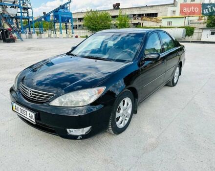 Черный Тойота Камри, объемом двигателя 3 л и пробегом 195 тыс. км за 6900 $, фото 1 на Automoto.ua