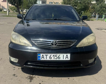 Чорний Тойота Камрі, об'ємом двигуна 2.36 л та пробігом 357 тис. км за 6000 $, фото 1 на Automoto.ua