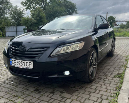 Черный Тойота Камри, объемом двигателя 3.46 л и пробегом 319 тыс. км за 7999 $, фото 1 на Automoto.ua