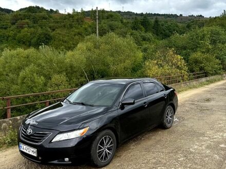 Черный Тойота Камри, объемом двигателя 2.4 л и пробегом 280 тыс. км за 8500 $, фото 1 на Automoto.ua