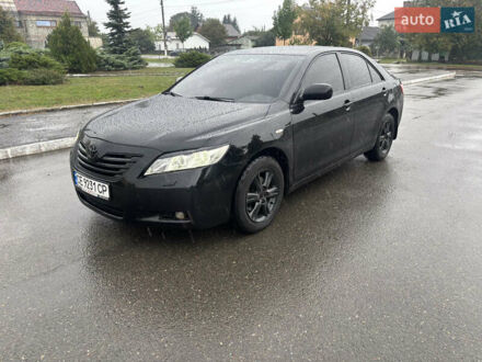 Черный Тойота Камри, объемом двигателя 3.46 л и пробегом 320 тыс. км за 6700 $, фото 1 на Automoto.ua