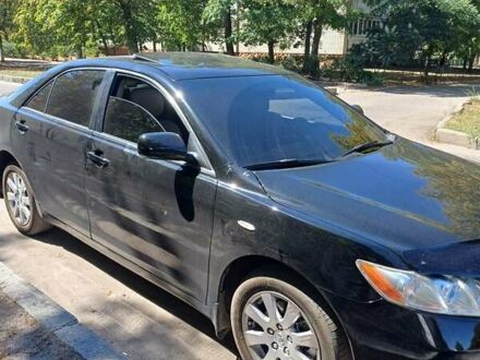 Черный Тойота Камри, объемом двигателя 3.5 л и пробегом 310 тыс. км за 7500 $, фото 1 на Automoto.ua