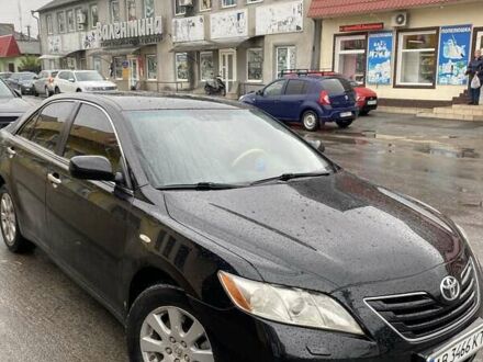 Черный Тойота Камри, объемом двигателя 3.5 л и пробегом 300 тыс. км за 7500 $, фото 1 на Automoto.ua