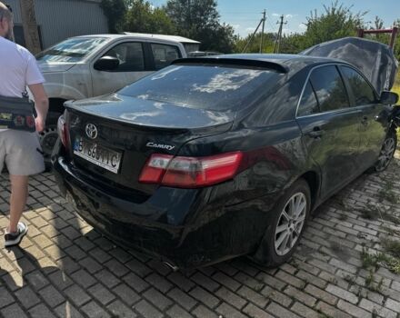 Черный Тойота Камри, объемом двигателя 2.4 л и пробегом 300 тыс. км за 4800 $, фото 1 на Automoto.ua