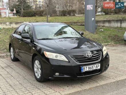 Чорний Тойота Камрі, об'ємом двигуна 2.4 л та пробігом 290 тис. км за 7500 $, фото 1 на Automoto.ua