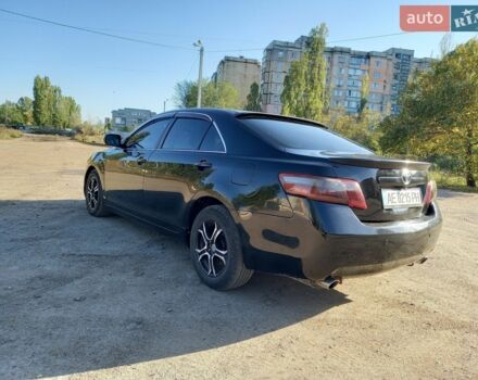 Черный Тойота Камри, объемом двигателя 3.46 л и пробегом 265 тыс. км за 6500 $, фото 1 на Automoto.ua