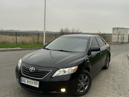 Черный Тойота Камри, объемом двигателя 2.4 л и пробегом 285 тыс. км за 7800 $, фото 1 на Automoto.ua