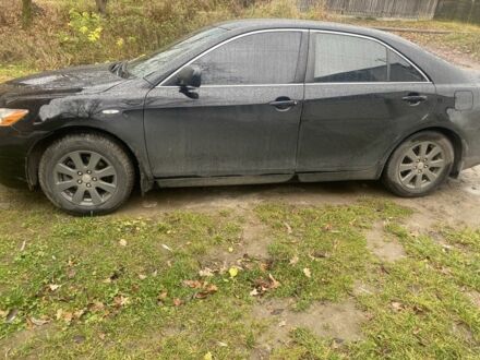 Черный Тойота Камри, объемом двигателя 2.4 л и пробегом 210 тыс. км за 2300 $, фото 1 на Automoto.ua