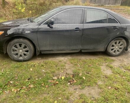 Черный Тойота Камри, объемом двигателя 2.4 л и пробегом 210 тыс. км за 2300 $, фото 1 на Automoto.ua