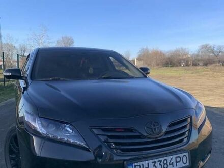 Черный Тойота Камри, объемом двигателя 2.4 л и пробегом 265 тыс. км за 8050 $, фото 1 на Automoto.ua