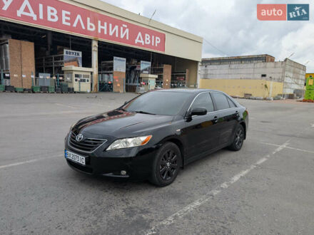 Черный Тойота Камри, объемом двигателя 2.4 л и пробегом 260 тыс. км за 8800 $, фото 1 на Automoto.ua