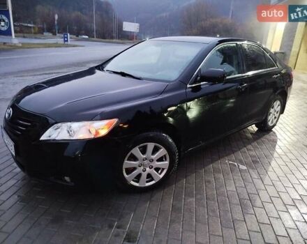 Черный Тойота Камри, объемом двигателя 2.36 л и пробегом 245 тыс. км за 8300 $, фото 1 на Automoto.ua