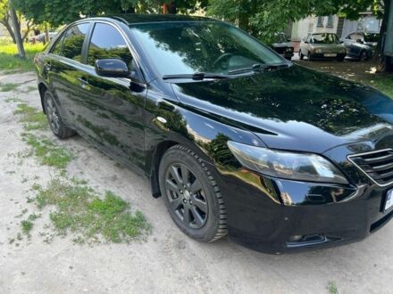 Чорний Тойота Камрі, об'ємом двигуна 2.4 л та пробігом 260 тис. км за 8200 $, фото 1 на Automoto.ua
