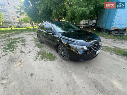 Черный Тойота Камри, объемом двигателя 2.4 л и пробегом 260 тыс. км за 8200 $, фото 1 на Automoto.ua
