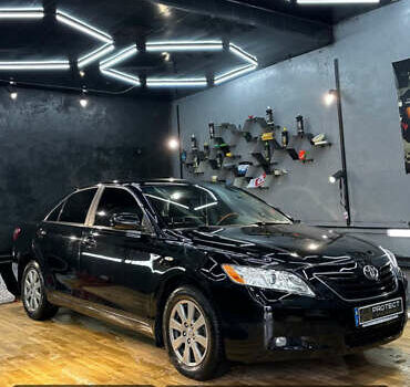 Черный Тойота Камри, объемом двигателя 3.46 л и пробегом 233 тыс. км за 10500 $, фото 1 на Automoto.ua