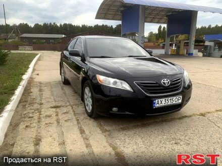 Черный Тойота Камри, объемом двигателя 3.5 л и пробегом 200 тыс. км за 10000 $, фото 1 на Automoto.ua