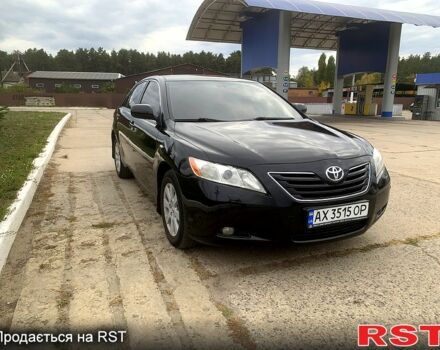 Черный Тойота Камри, объемом двигателя 3.5 л и пробегом 200 тыс. км за 10000 $, фото 1 на Automoto.ua
