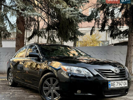 Черный Тойота Камри, объемом двигателя 3.46 л и пробегом 198 тыс. км за 10000 $, фото 1 на Automoto.ua