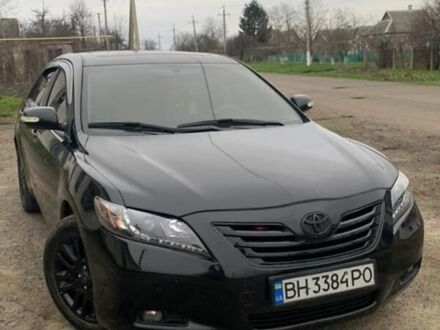 Черный Тойота Камри, объемом двигателя 2.4 л и пробегом 214 тыс. км за 7200 $, фото 1 на Automoto.ua