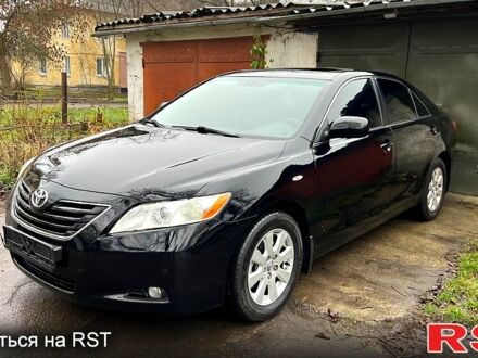 Черный Тойота Камри, объемом двигателя 2.4 л и пробегом 183 тыс. км за 7800 $, фото 1 на Automoto.ua