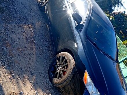 Черный Тойота Камри, объемом двигателя 2.4 л и пробегом 270 тыс. км за 8000 $, фото 1 на Automoto.ua