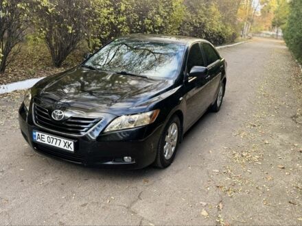 Черный Тойота Камри, объемом двигателя 2.4 л и пробегом 350 тыс. км за 6399 $, фото 1 на Automoto.ua