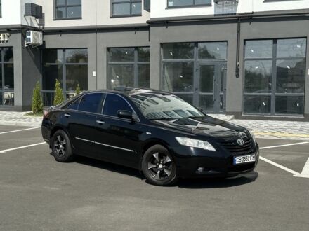 Чорний Тойота Камрі, об'ємом двигуна 2.4 л та пробігом 227 тис. км за 8600 $, фото 1 на Automoto.ua