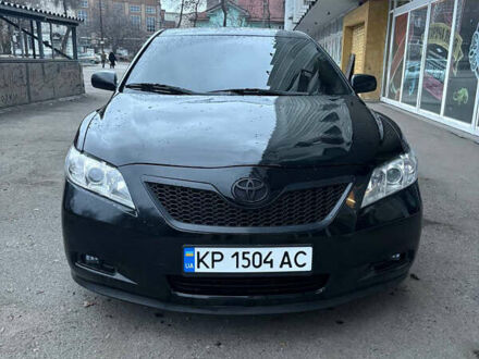 Черный Тойота Камри, объемом двигателя 2.36 л и пробегом 357 тыс. км за 6900 $, фото 1 на Automoto.ua