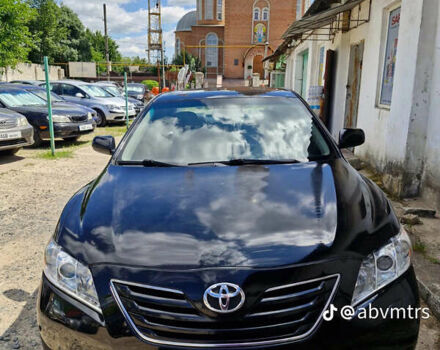 Черный Тойота Камри, объемом двигателя 2.4 л и пробегом 211 тыс. км за 7700 $, фото 1 на Automoto.ua
