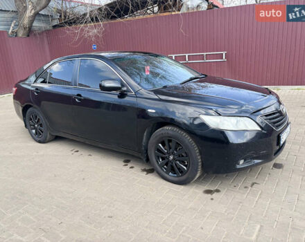 Черный Тойота Камри, объемом двигателя 2.36 л и пробегом 320 тыс. км за 7000 $, фото 1 на Automoto.ua