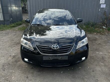 Чорний Тойота Камрі, об'ємом двигуна 2.4 л та пробігом 251 тис. км за 8899 $, фото 1 на Automoto.ua