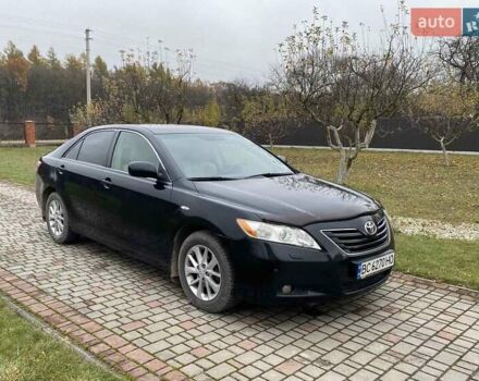 Черный Тойота Камри, объемом двигателя 2.4 л и пробегом 227 тыс. км за 8600 $, фото 1 на Automoto.ua