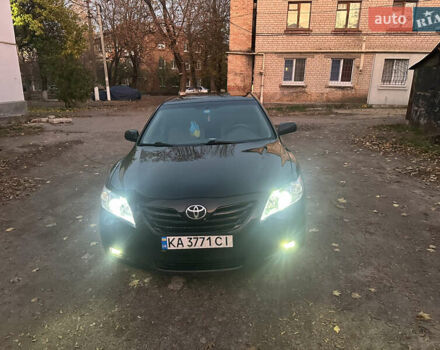 Черный Тойота Камри, объемом двигателя 2.36 л и пробегом 249 тыс. км за 7000 $, фото 1 на Automoto.ua