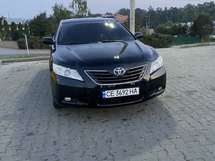 Чорний Тойота Камрі, об'ємом двигуна 2.4 л та пробігом 290 тис. км за 8395 $, фото 1 на Automoto.ua