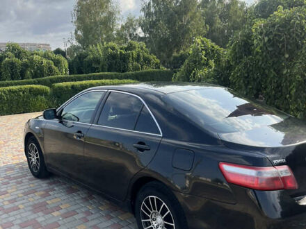 Черный Тойота Камри, объемом двигателя 2.36 л и пробегом 260 тыс. км за 7800 $, фото 1 на Automoto.ua