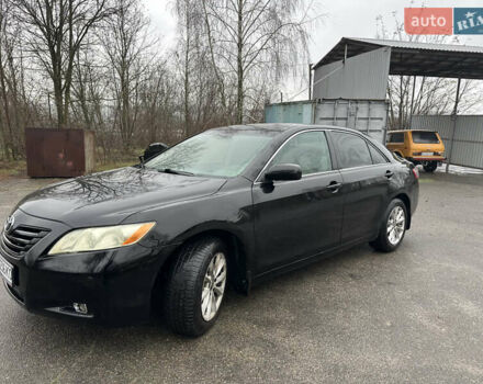 Черный Тойота Камри, объемом двигателя 2.4 л и пробегом 232 тыс. км за 6850 $, фото 1 на Automoto.ua