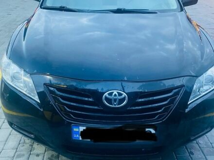 Черный Тойота Камри, объемом двигателя 2.4 л и пробегом 274 тыс. км за 7500 $, фото 1 на Automoto.ua