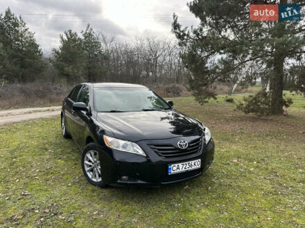 Черный Тойота Камри, объемом двигателя 2.36 л и пробегом 214 тыс. км за 7200 $, фото 1 на Automoto.ua