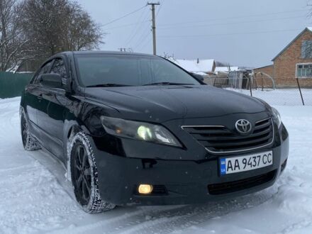 Черный Тойота Камри, объемом двигателя 2.4 л и пробегом 270 тыс. км за 7500 $, фото 1 на Automoto.ua