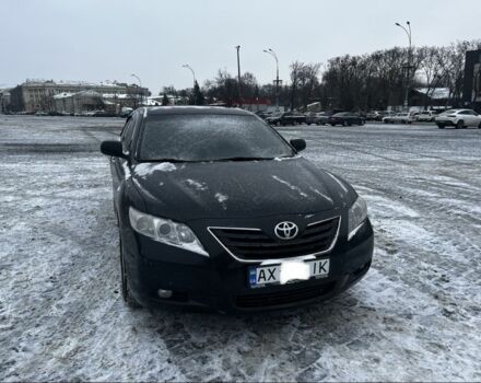 Черный Тойота Камри, объемом двигателя 2.4 л и пробегом 330 тыс. км за 8000 $, фото 1 на Automoto.ua