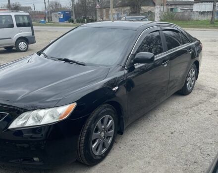 Черный Тойота Камри, объемом двигателя 2.4 л и пробегом 250 тыс. км за 8500 $, фото 1 на Automoto.ua