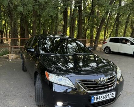 Чорний Тойота Камрі, об'ємом двигуна 2.4 л та пробігом 316 тис. км за 7800 $, фото 1 на Automoto.ua