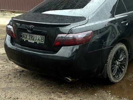 Чорний Тойота Камрі, об'ємом двигуна 2.4 л та пробігом 330 тис. км за 8500 $, фото 1 на Automoto.ua