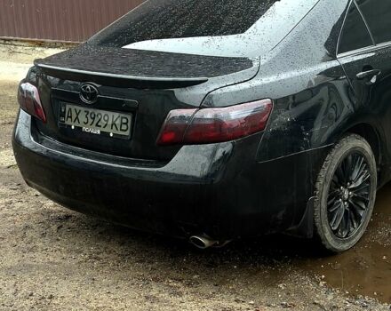 Черный Тойота Камри, объемом двигателя 2.4 л и пробегом 330 тыс. км за 8500 $, фото 1 на Automoto.ua