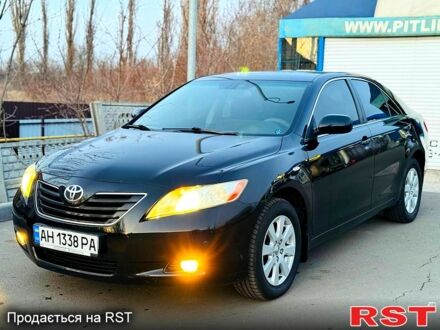 Черный Тойота Камри, объемом двигателя 2.4 л и пробегом 209 тыс. км за 8200 $, фото 1 на Automoto.ua