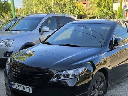 Черный Тойота Камри, объемом двигателя 2.36 л и пробегом 187 тыс. км за 10900 $, фото 1 на Automoto.ua