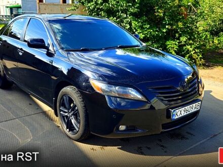 Черный Тойота Камри, объемом двигателя 2.4 л и пробегом 233 тыс. км за 8500 $, фото 1 на Automoto.ua