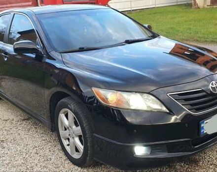Черный Тойота Камри, объемом двигателя 2.4 л и пробегом 173 тыс. км за 7999 $, фото 1 на Automoto.ua